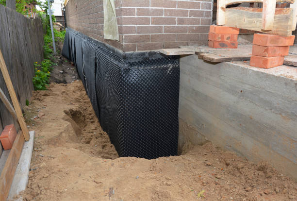 Happy homeowners after waterproofing job in Somerdale